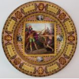 A Viennese painted and enamelled porcelain cabinet plate round plate with pink ground, painted