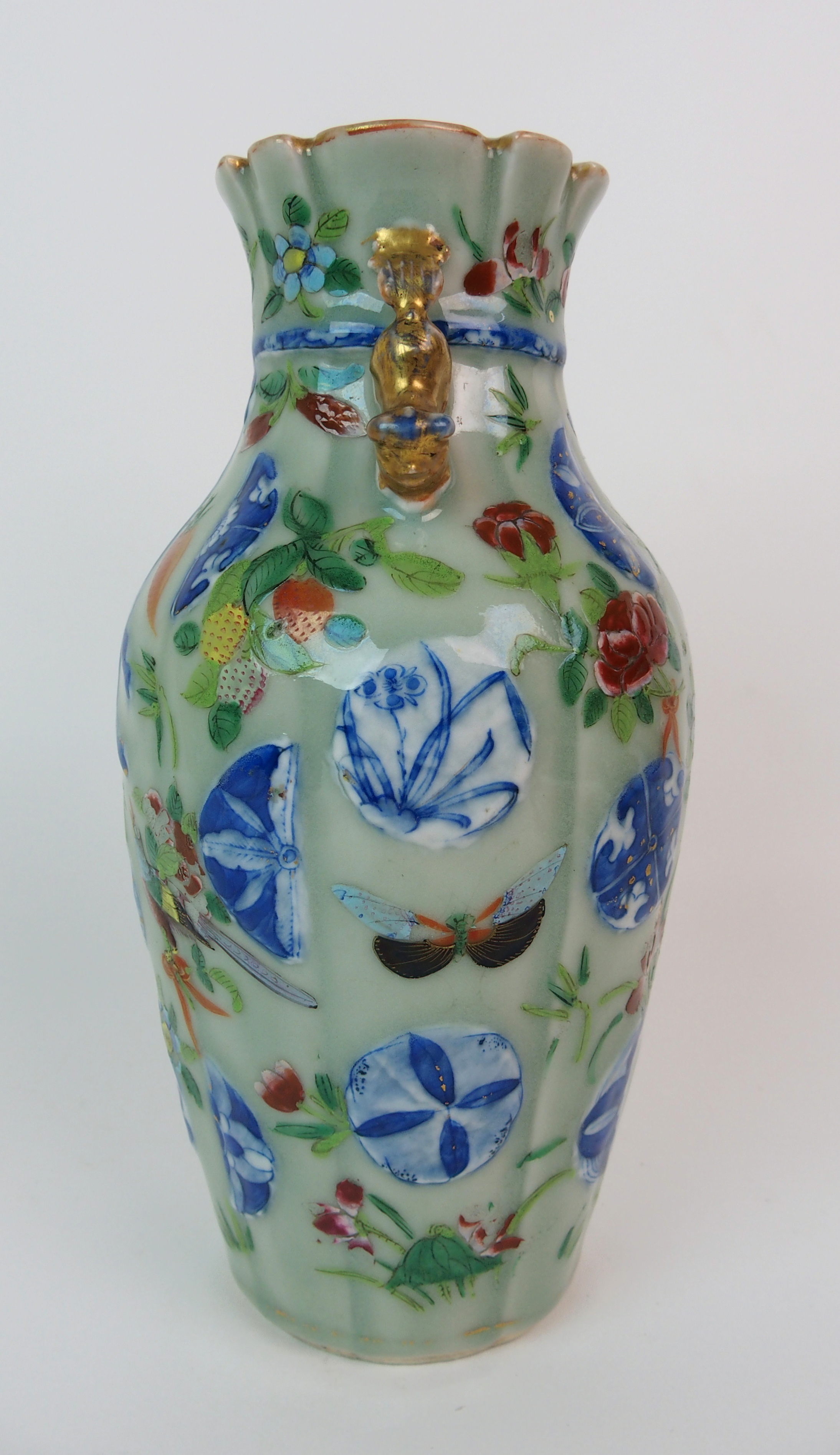 A Cantonese celadon ground and relief moulded sack shaped vase painted with butterflies and - Image 5 of 10