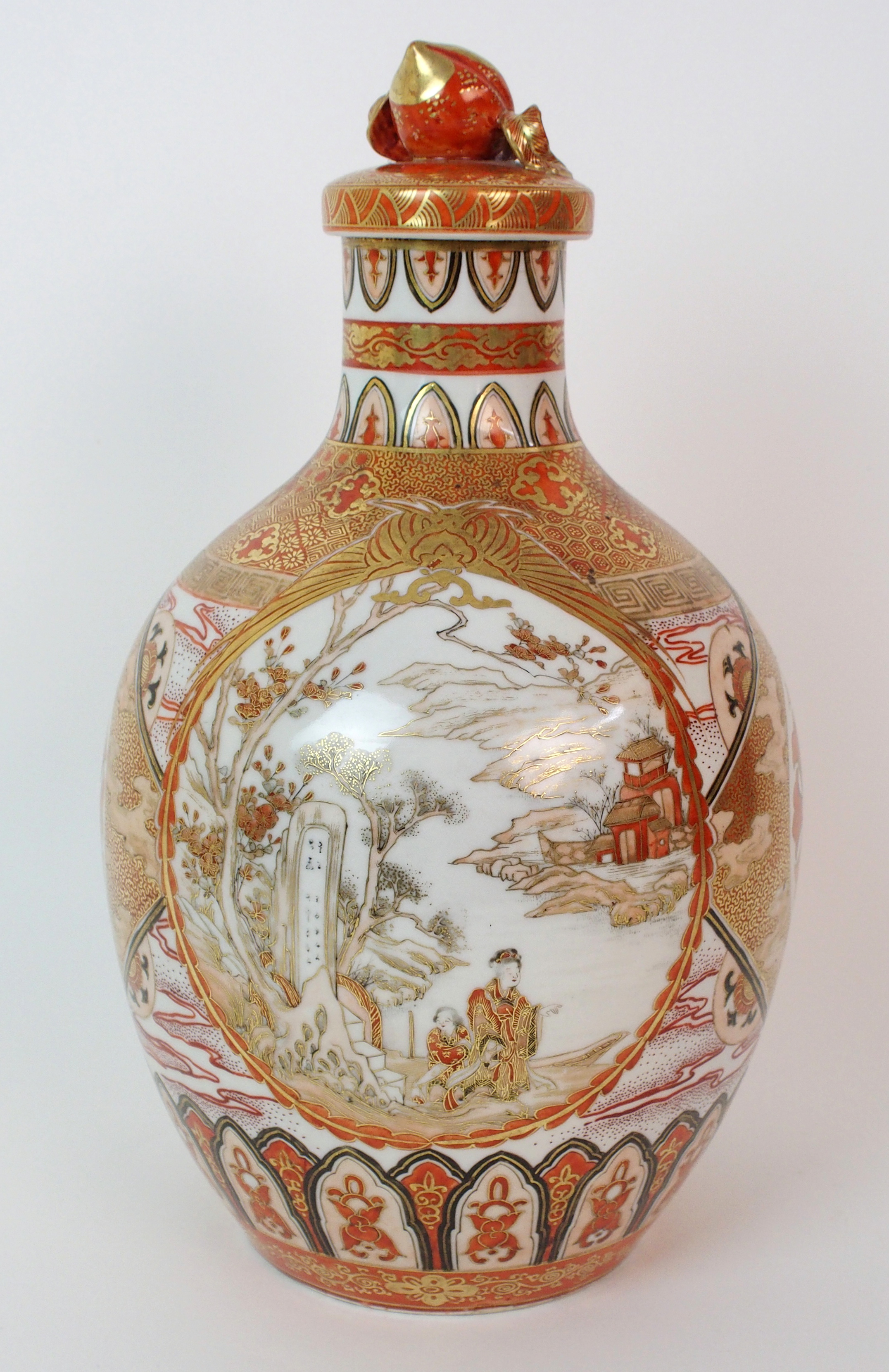 A Kutani bottle shaped vase and cover painted with medallions of figures, peacocks, pine within gilt - Image 3 of 10