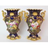 A pair of Coalport painted porcelain vases Rococo-style double-handled tapering flattened vases with