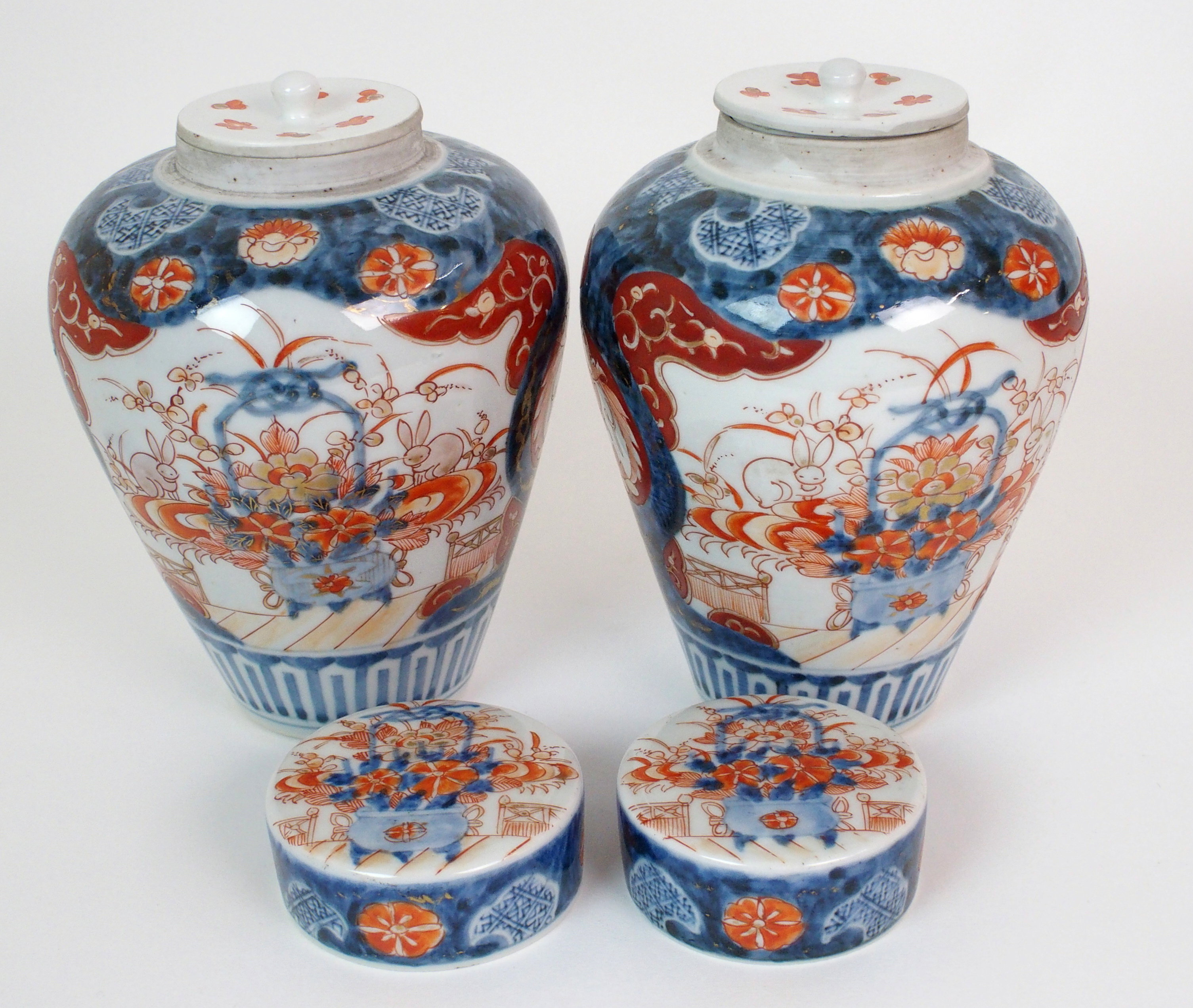 A pair of Imari baluster vases, covers and liners  painted with jardinieres of flowers and rabbits - Image 8 of 10