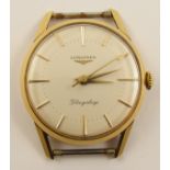 A gents 18ct gold Longines Flagship watch head the champagne dial has gold coloured baton