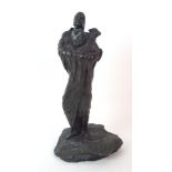 An American patinated cast bronze figure of a Native American woman 20th Century, depicting a