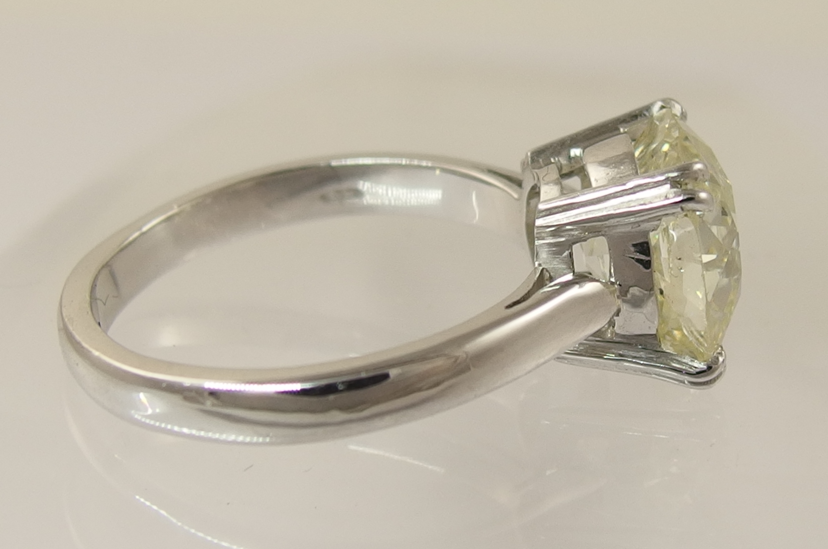 A 5ct cushion cut diamond ring simply split four claw set in 18ct white gold the substantial diamond - Image 10 of 10
