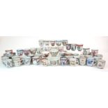 Forty Seven various Chinese export tea-cups painted with flowers, figures, birds and monograms and