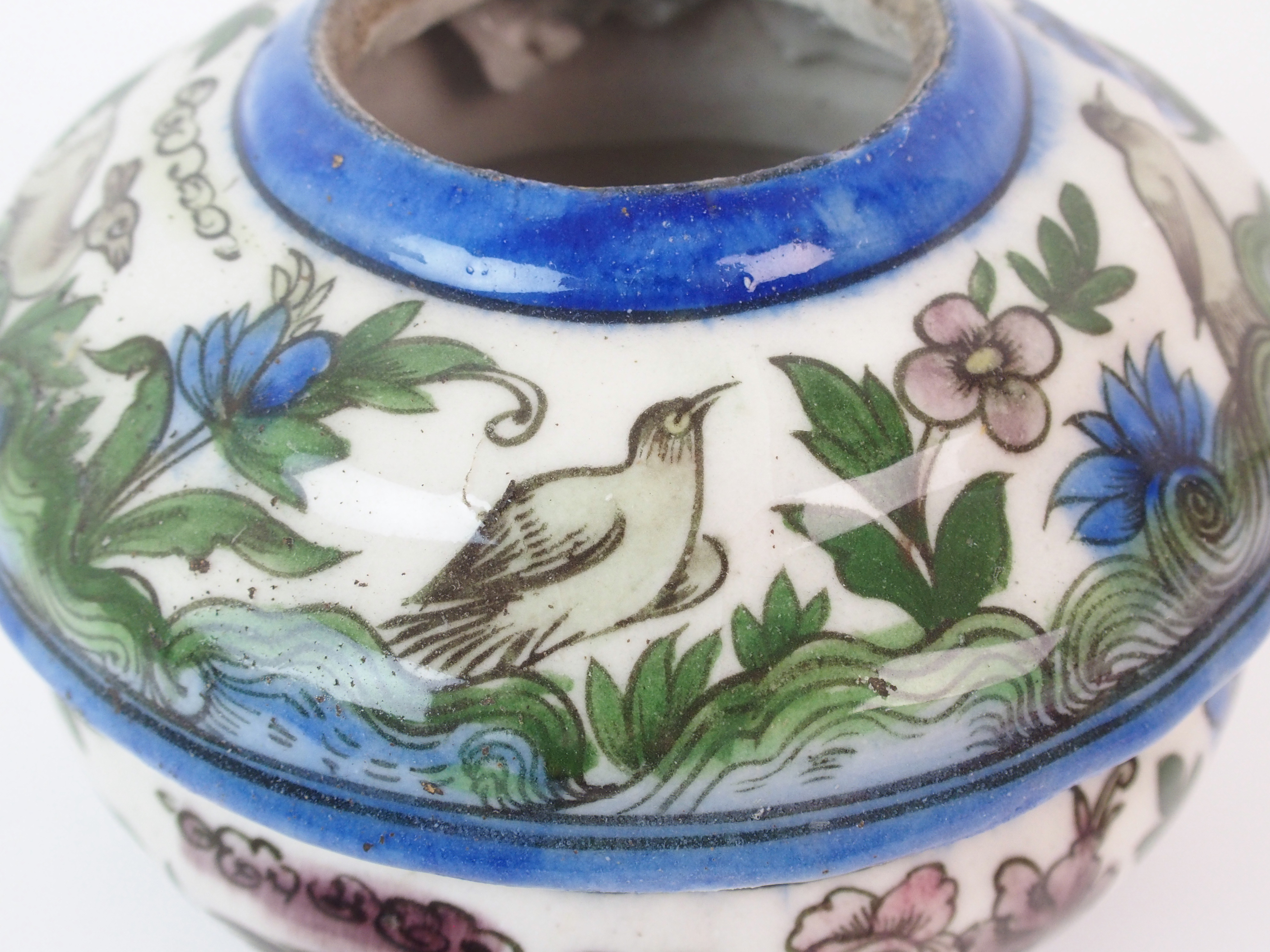 A Persian pottery oil lampbase painted with birds and flowers (glaze flaw), 14cm high and a marble - Image 8 of 10