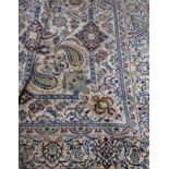 A Nain rug on a cream and blue ground, 3.44 x 2.37m