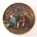 A Viennese painted porcelain plaque round plaque, painted interior scene with three figures and a