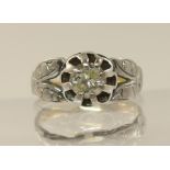 A solitaire diamond ring of approx 0.40cts the diamond is held in a basket claw mount with pierced