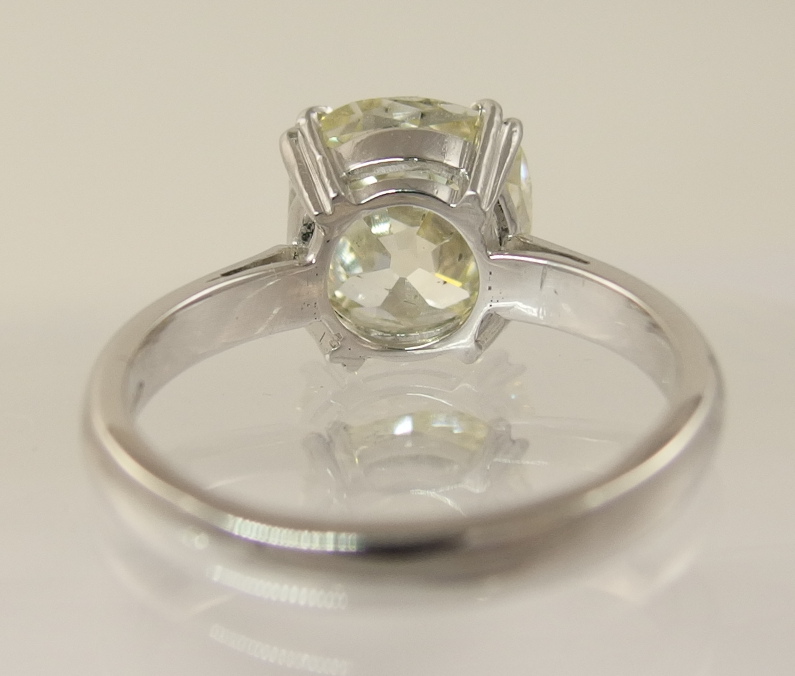 A 5ct cushion cut diamond ring simply split four claw set in 18ct white gold the substantial diamond - Image 8 of 10