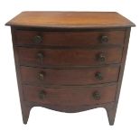 A Georgian mahogany small bowfront chest with four graduating drawers on splayed legs, 63cm wide