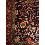 A Cilihan rug on a red and blue ground, 3.18 x 1.70m