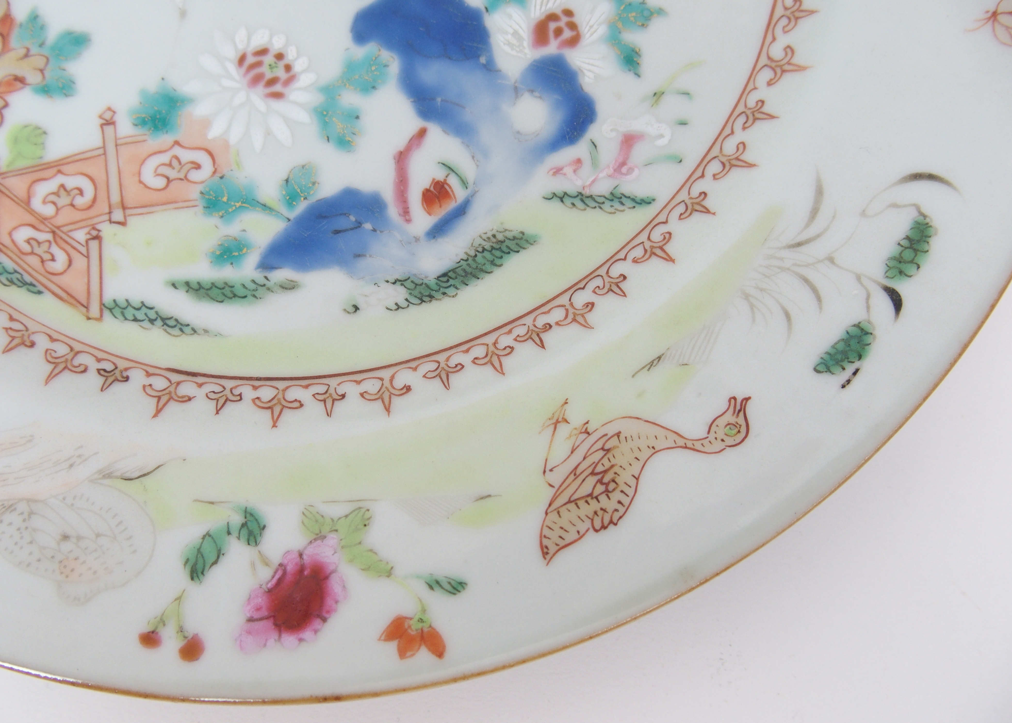 A Chinese famille rose export charger painted with a peacock and hen within a border of birds and - Image 9 of 10