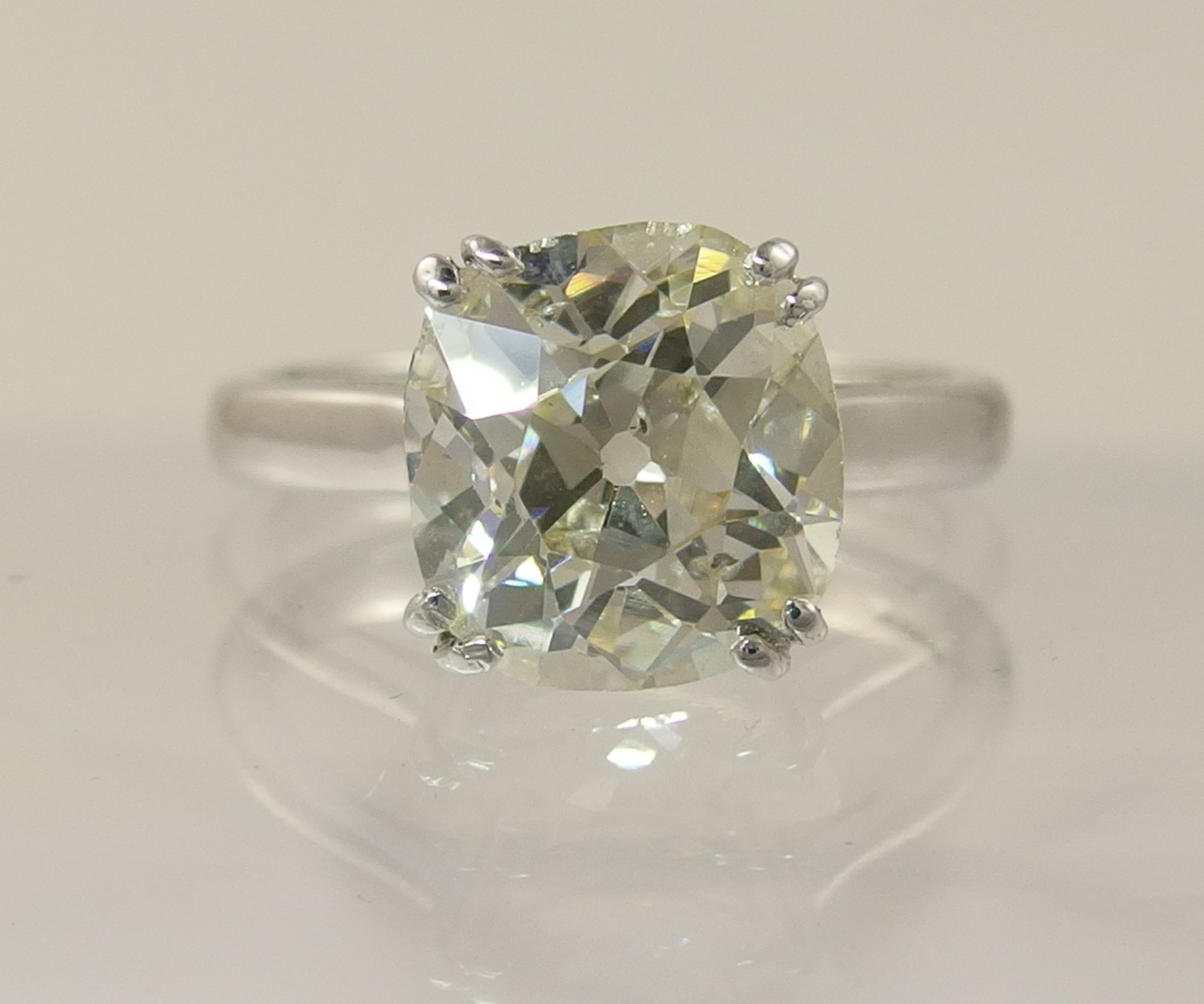 A 5ct cushion cut diamond ring simply split four claw set in 18ct white gold the substantial diamond - Image 3 of 10