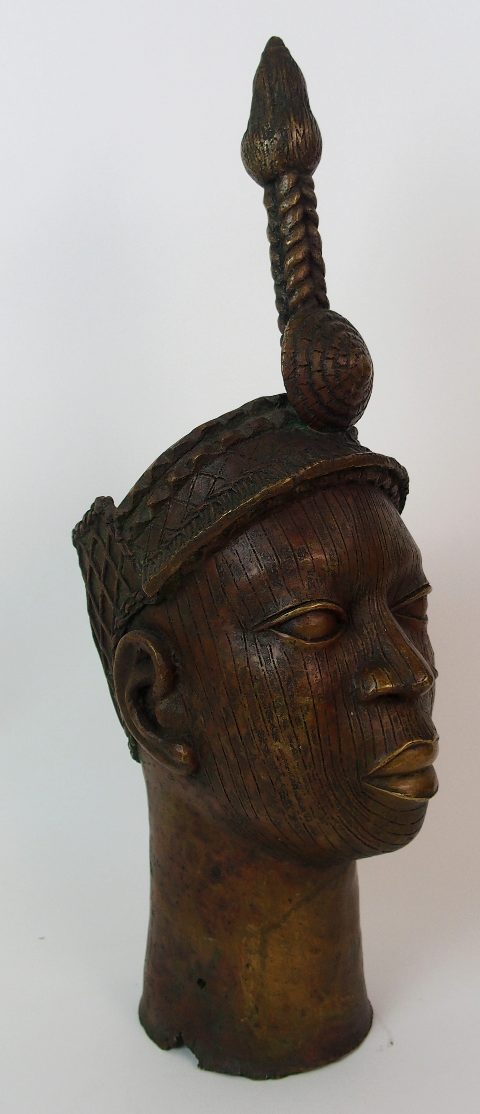 A Benin female brass head with high tied hair ornament with scarafied face, 52cm high - Image 3 of 10