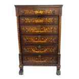 A Dutch mahogany marquetry chest with six drawers flanked by tapering columns and on heavily