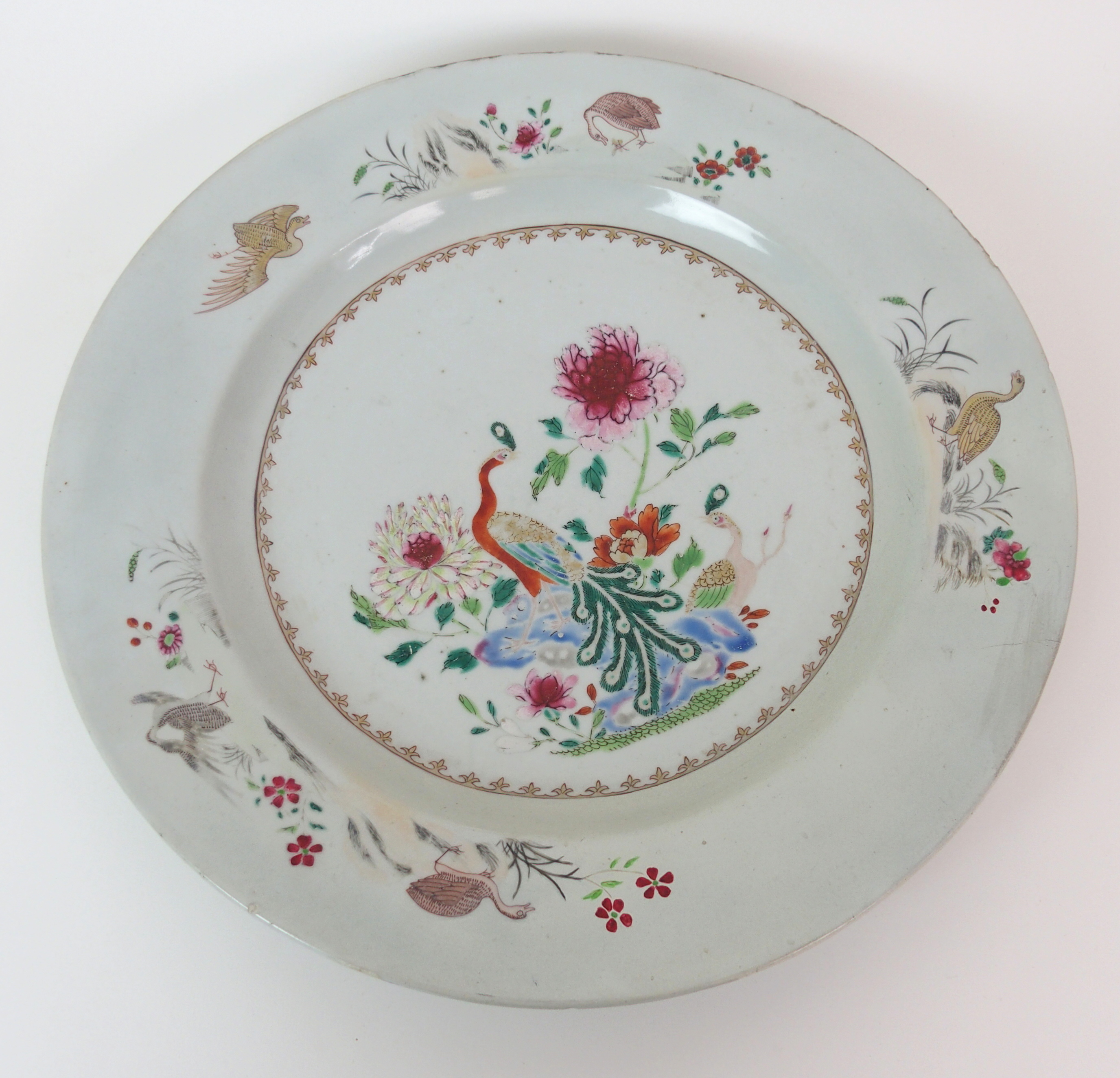 A Chinese famille rose export charger painted with a peacock and hen within a border of birds and - Image 2 of 10