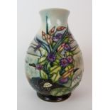 A Moorcroft Pottery Design Studio vase 1999, ovoid-form with waisted neck, aquatic plants and shells