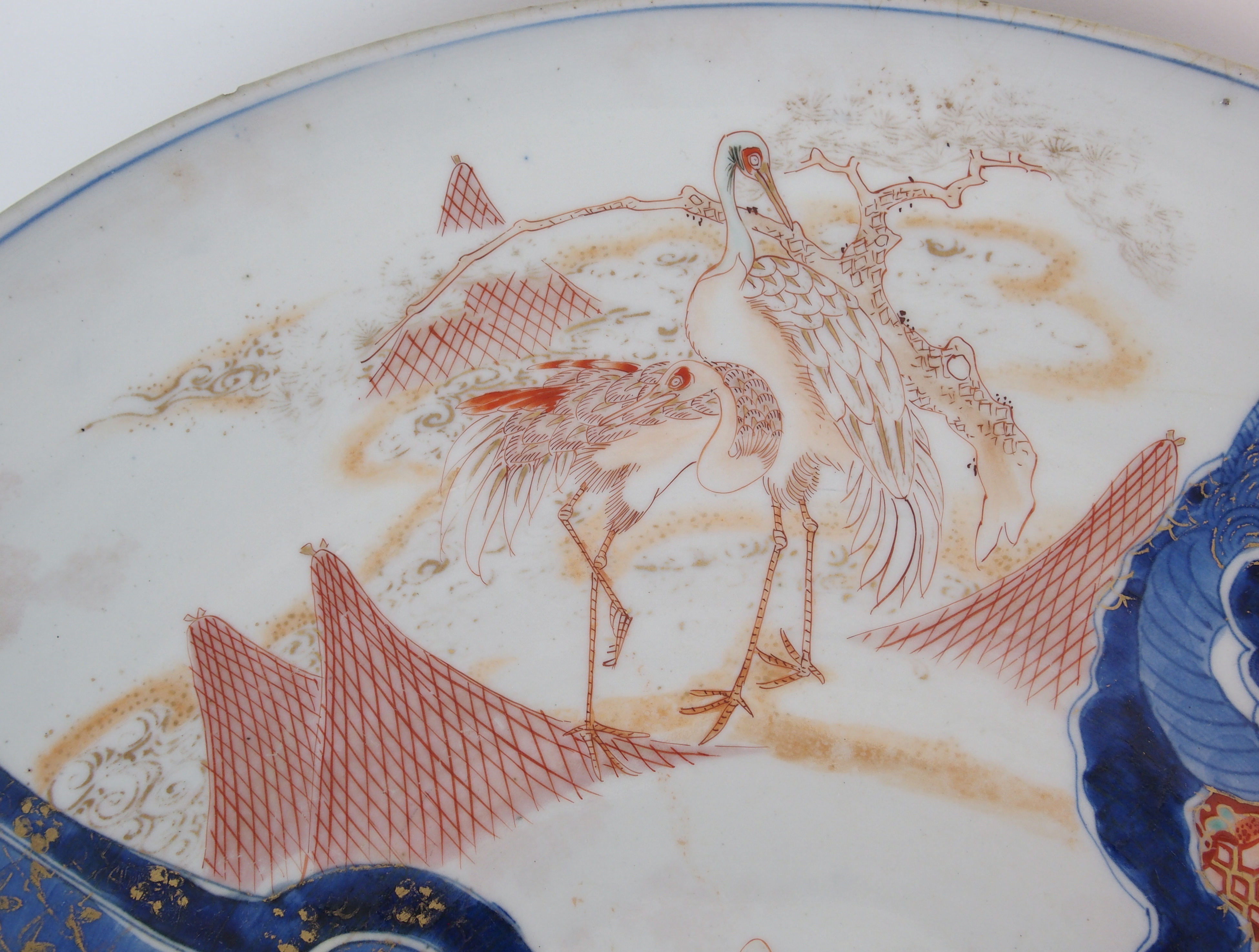 An Imari dish painted with fishermen, herons and a dragon (rim chips), signed, 50cm diameter - Image 5 of 10
