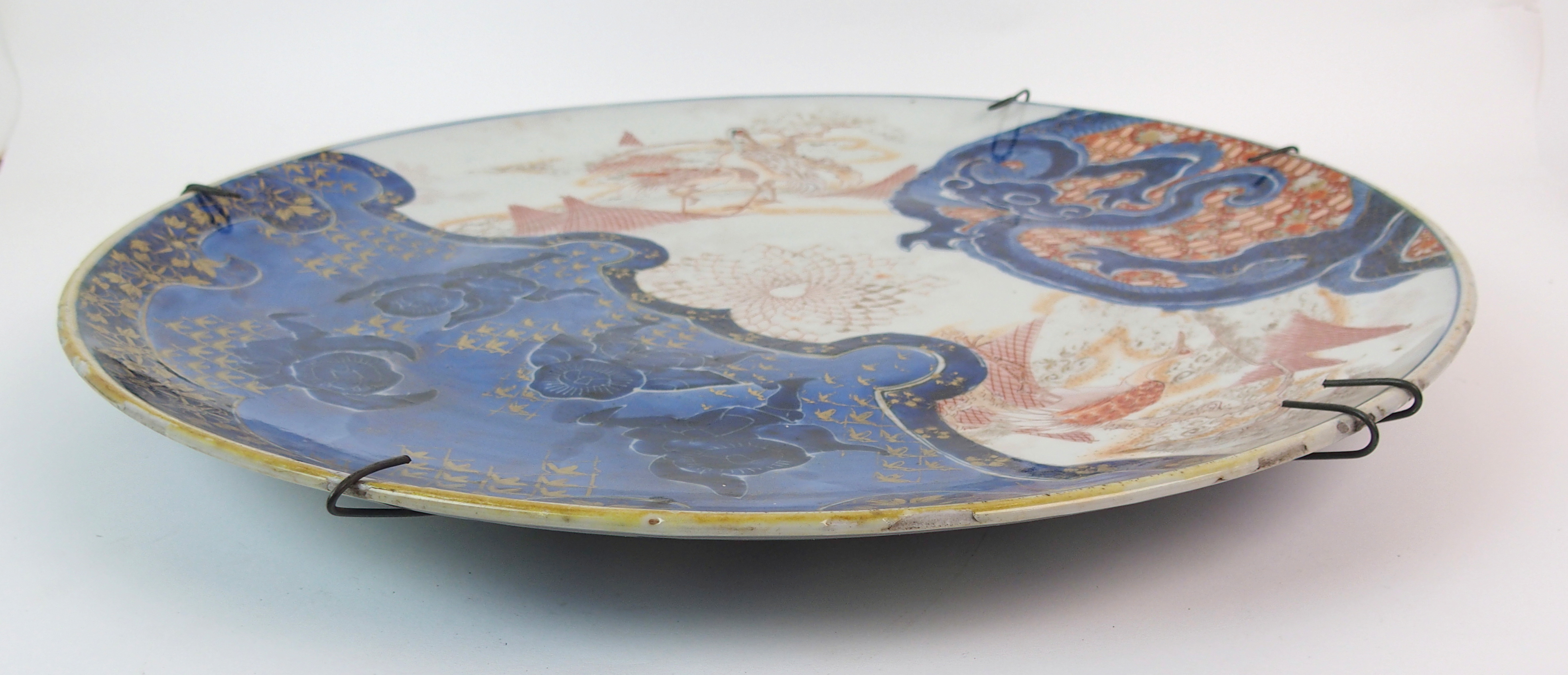 An Imari dish painted with fishermen, herons and a dragon (rim chips), signed, 50cm diameter - Image 7 of 10