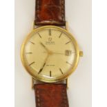 A 9ct Omega automatic De Ville the champagne coloured dial has gold coloured baton numerals with