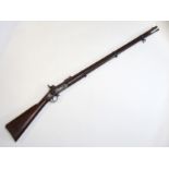 A Victorian Enfield percussion musket the barrel 97cm long, the lockplate marked VR with a crown and