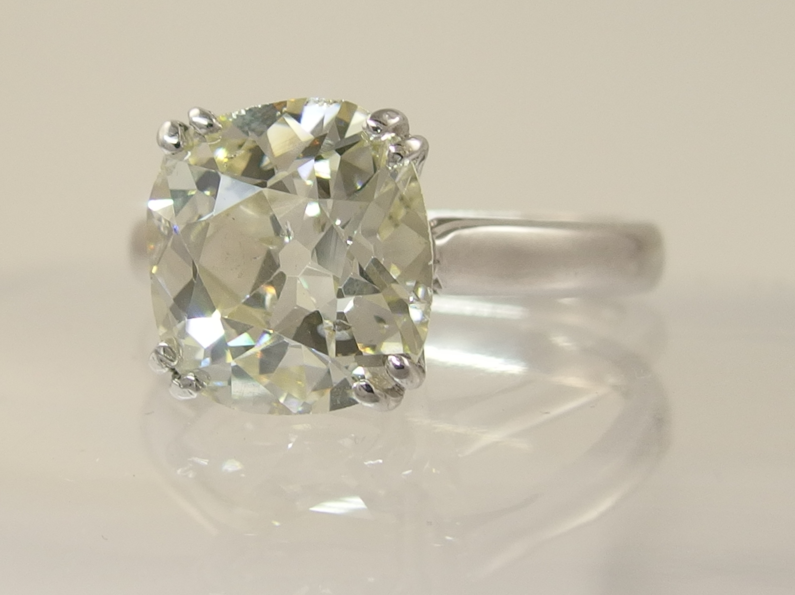 A 5ct cushion cut diamond ring simply split four claw set in 18ct white gold the substantial diamond - Image 5 of 10