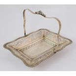 A swing handled silver cake basket unclear maker's marks, Birmingham 12904, of rectangular shape