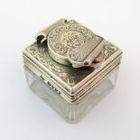 A Victorian silver topped travel inkwell maker's marks obscure, London 1856, the moulded glass