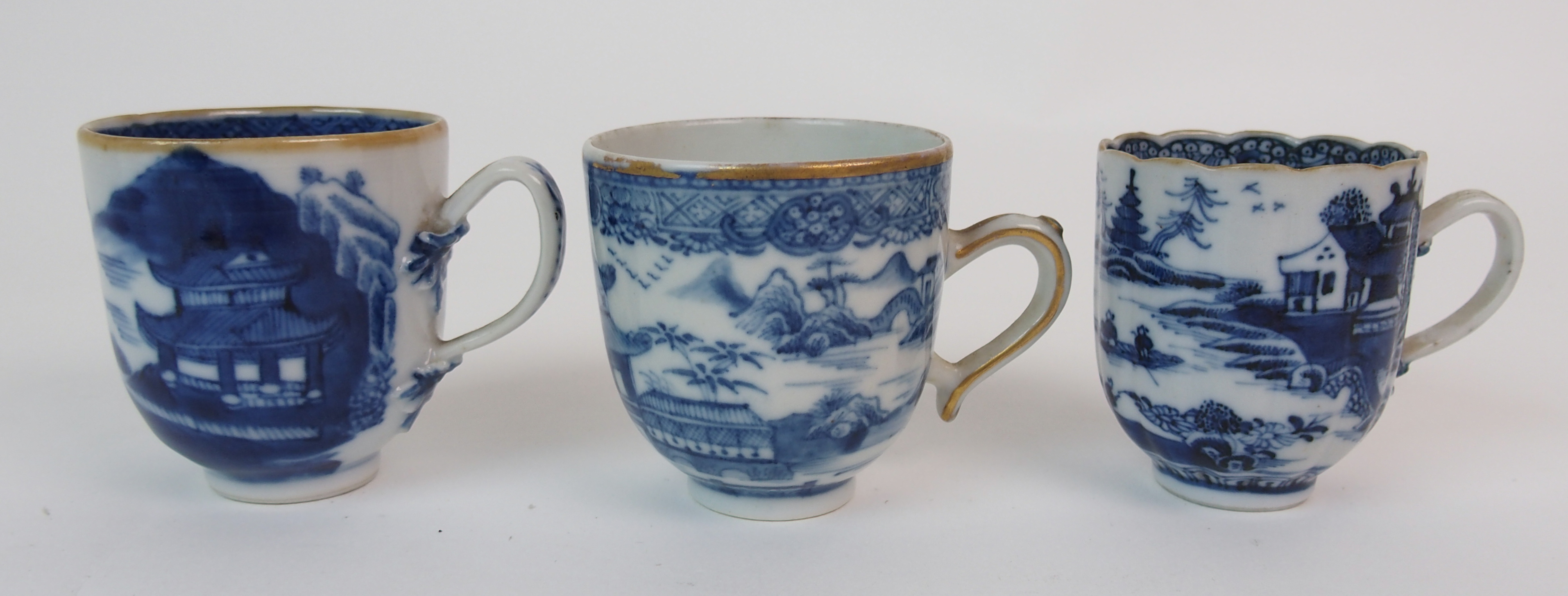 A group of twenty-three Chinese export teacups painted with typical landscapes and gilt rims, - Image 6 of 10