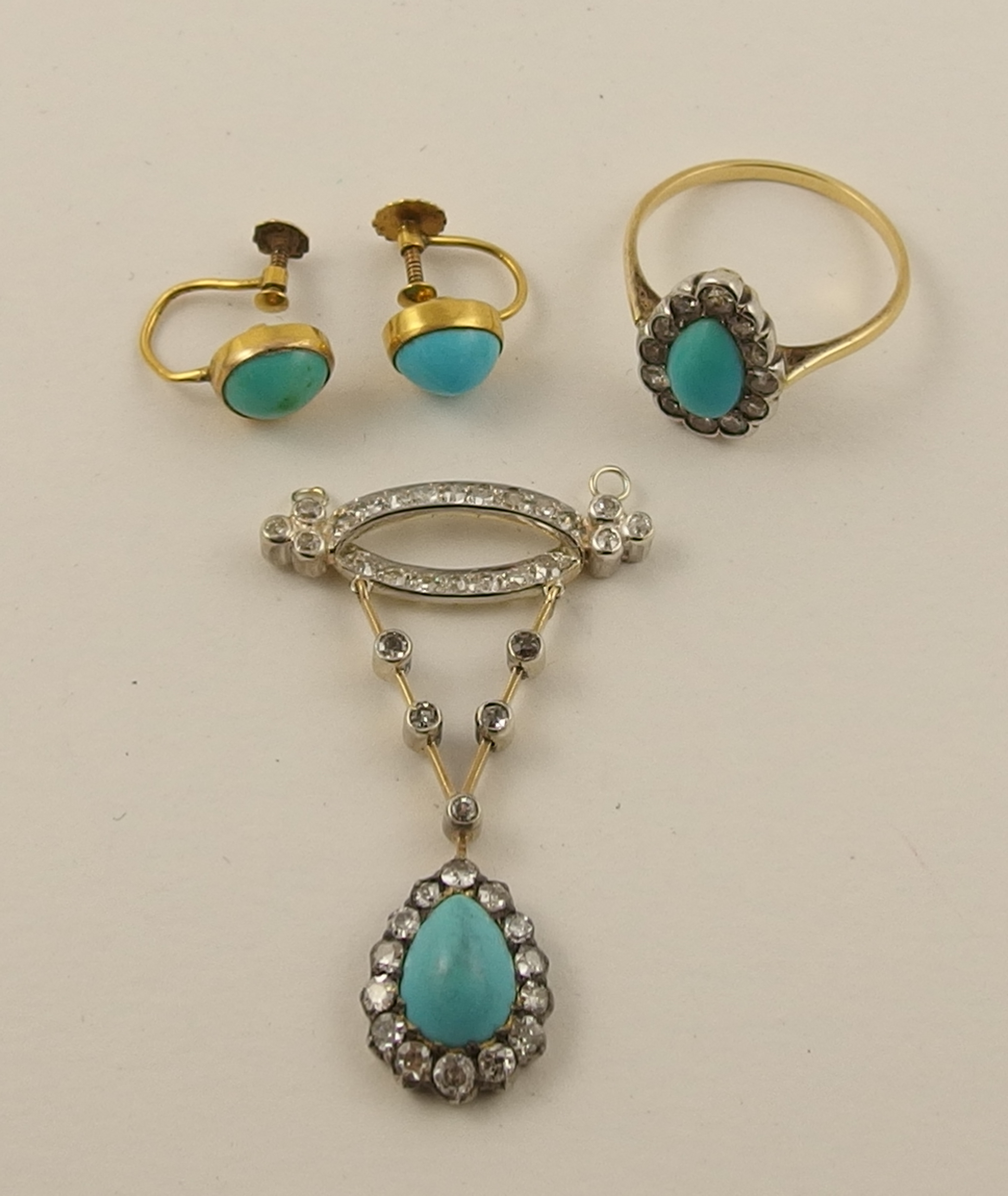 A turquoise and diamond pendant a pear shaped turquoise surrounded by old cut diamonds suspended - Image 2 of 4