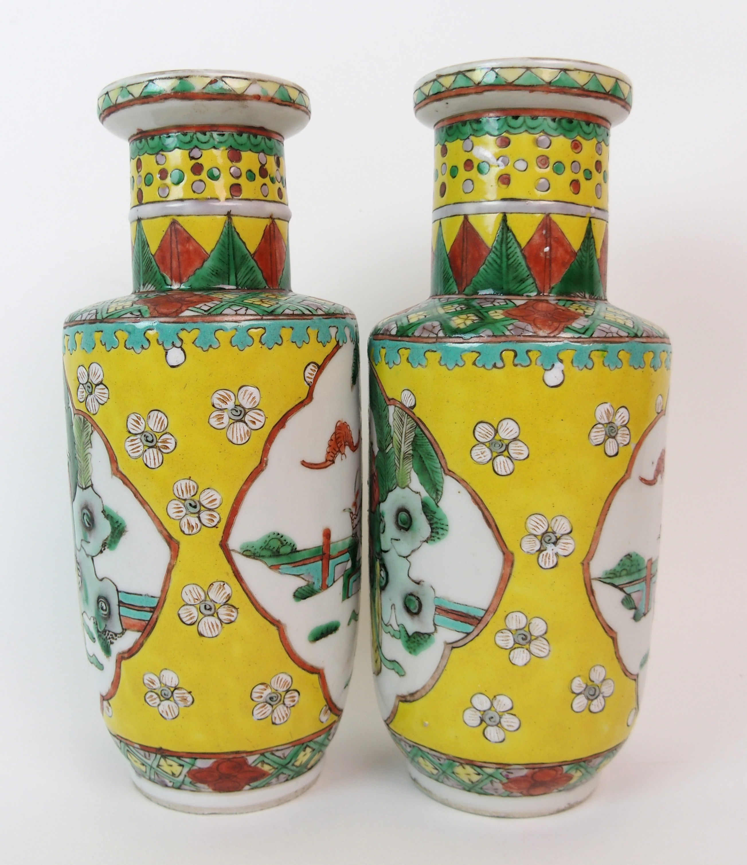 A pair of Chinese famille verte vases on a yellow ground, painted with panels of figures in ogival - Image 2 of 10