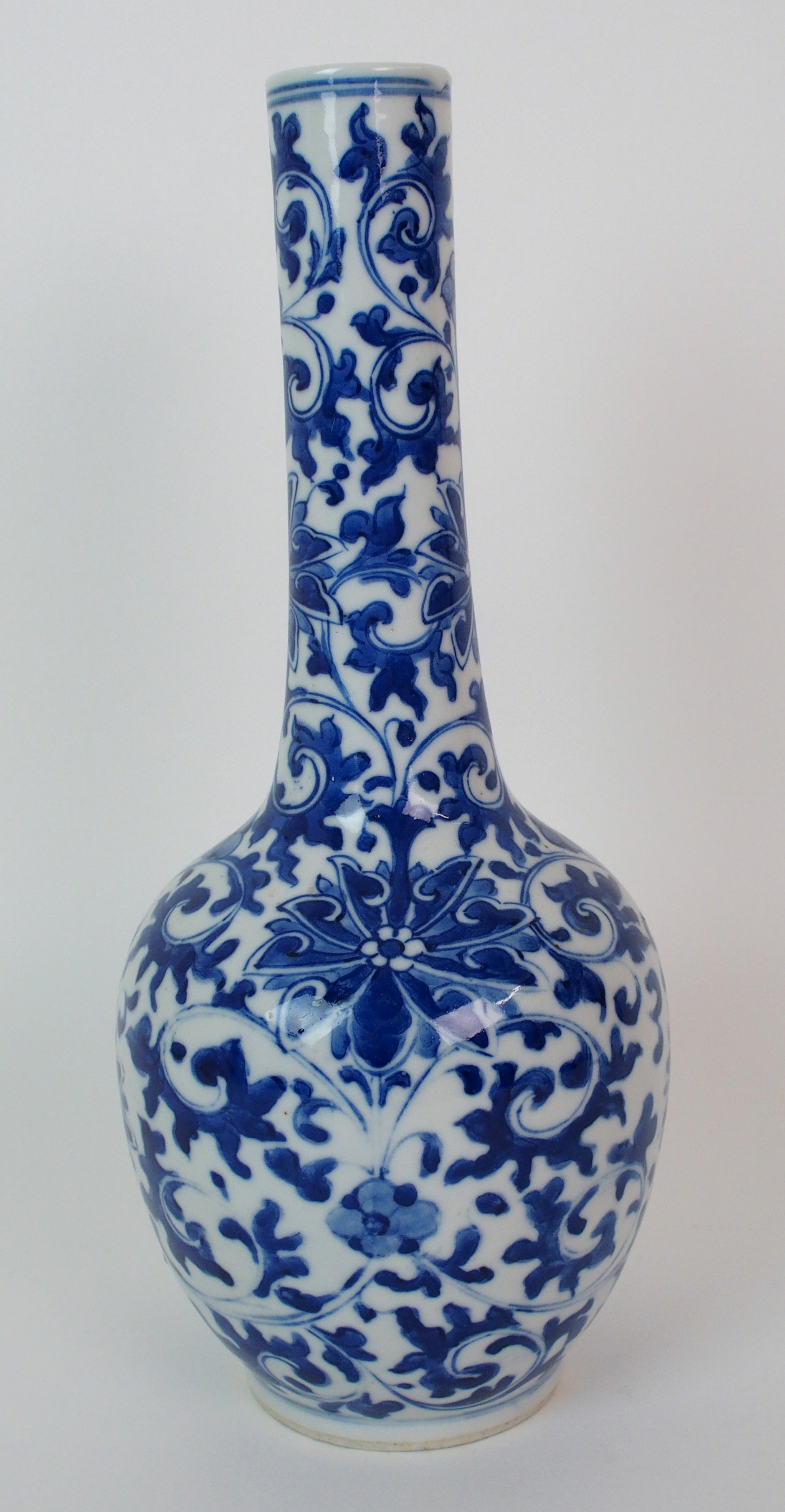 A Chinese blue and white bottle shaped vase painted with peonies and scrolling foliage, blue - Image 6 of 10