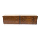 A pair of rosewood chests designed by Robert Heritage for Archie Shine each with three graduated