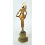 An Austrian Art Deco gilt bronze and ivory figure, by Josef Lorenzl (Austrian, 1892-1950) circa