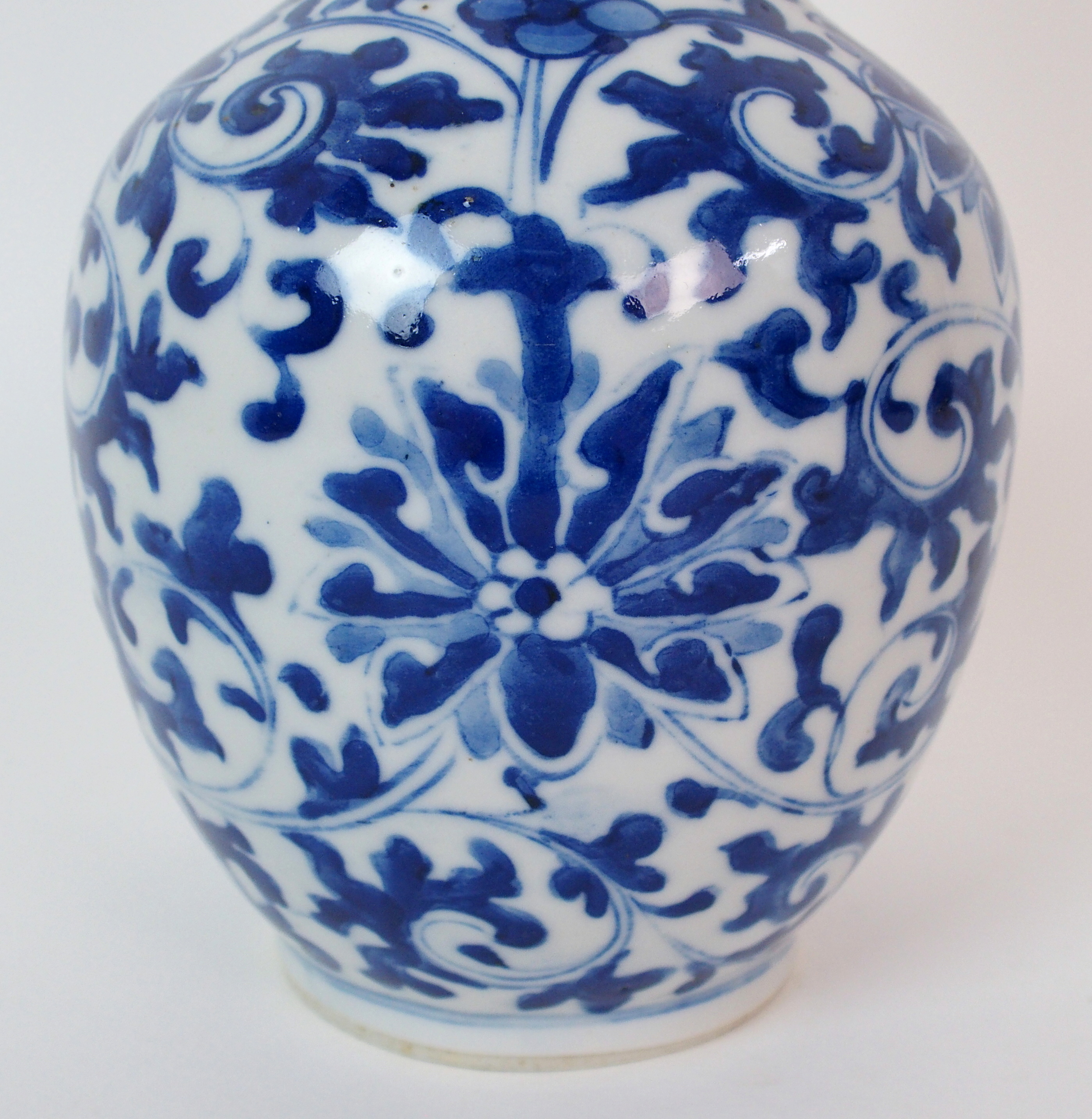 A Chinese blue and white bottle shaped vase painted with peonies and scrolling foliage, blue - Image 5 of 10