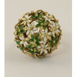 A high domed ring made from enamelled flowers the ring is made from yellow metal with a zigzag