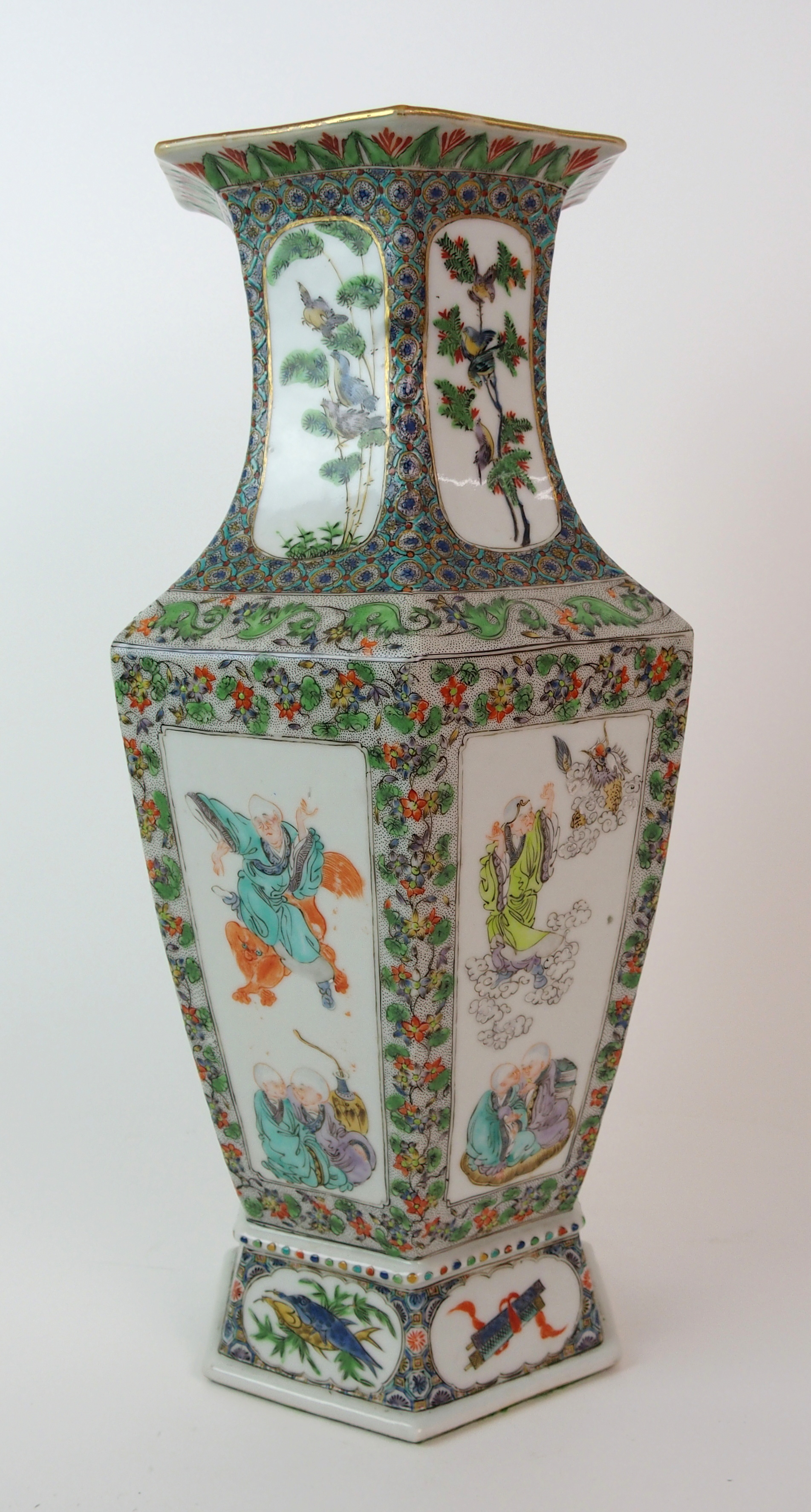 A Cantonese hexagonal tapering vase painted with panels of immortals within foliate and seed - Image 4 of 10
