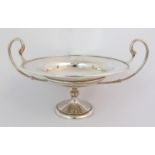 An Edwardian silver compote by Robert Stewart, London 1907, of circular shape, on knopped stem and