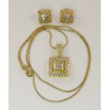 A square diamond set pendant with matching earrings pendant in 18ct gold with the centre set with