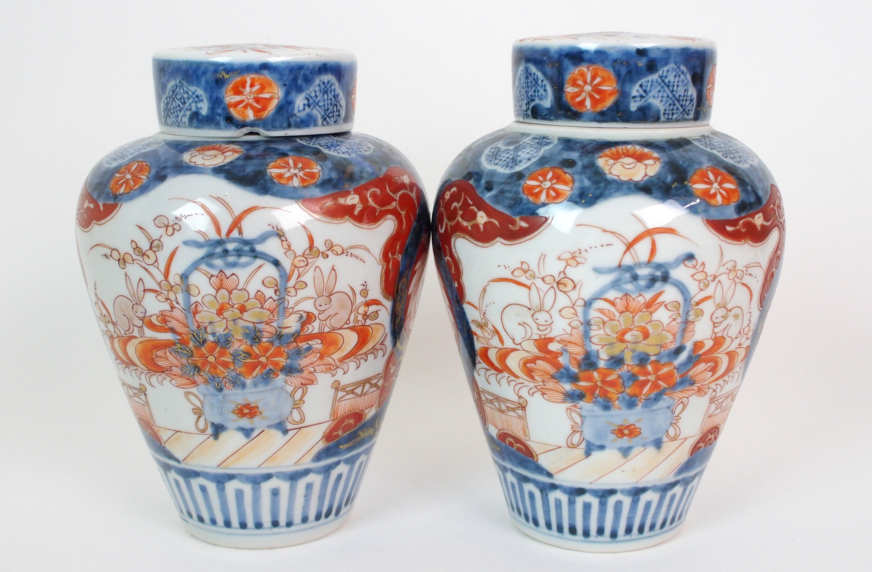 A pair of Imari baluster vases, covers and liners  painted with jardinieres of flowers and rabbits - Image 3 of 10