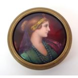 A French Limoges enamelled portrait roundel by Pierre Bonnard circa 1890, mounted within brass frame