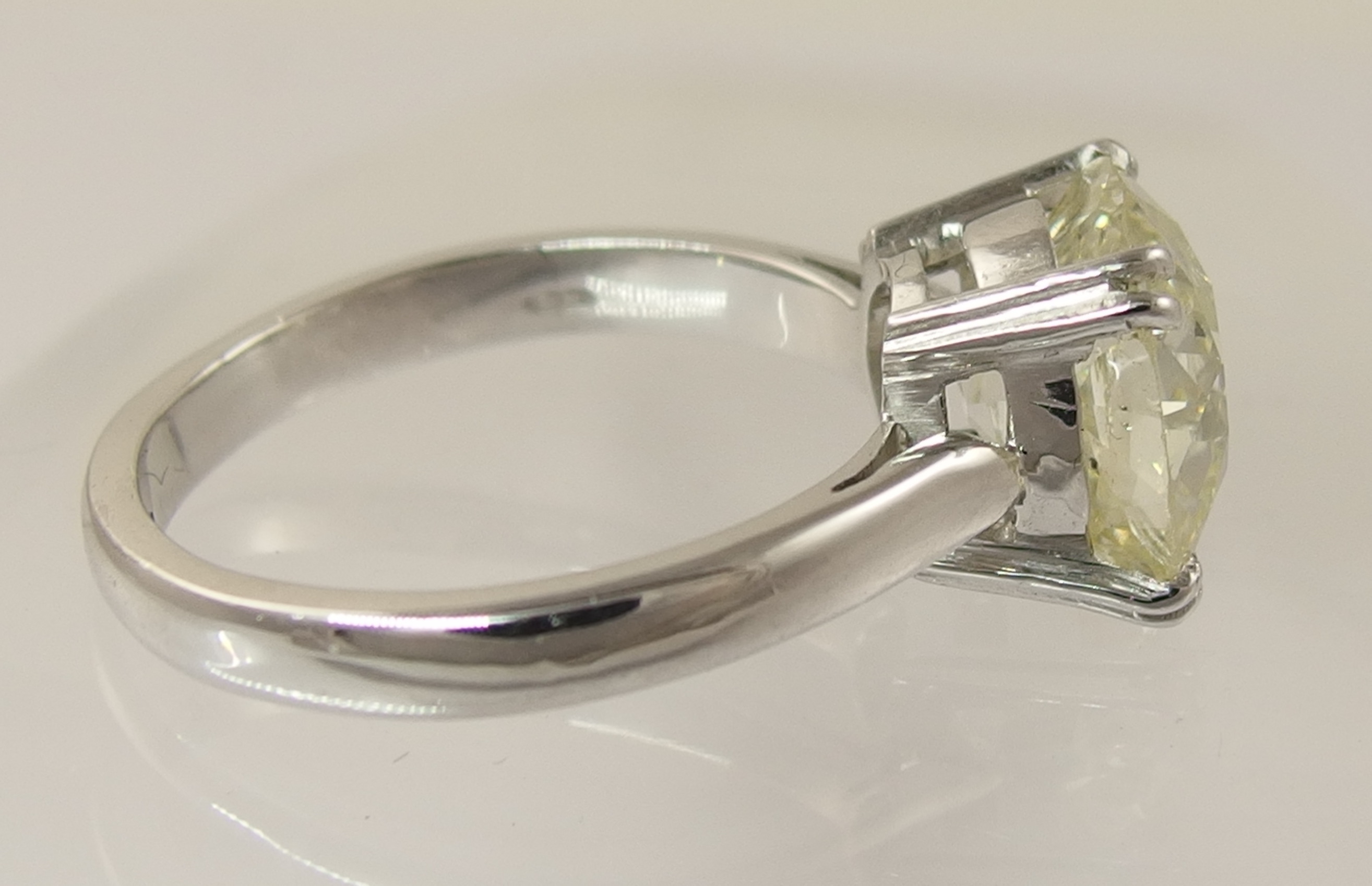 A 5ct cushion cut diamond ring simply split four claw set in 18ct white gold the substantial diamond - Image 9 of 10