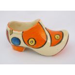 A Clarice Cliff Bizarre "Orange Battle" pattern porcelain clog circa 1929, painted with orange