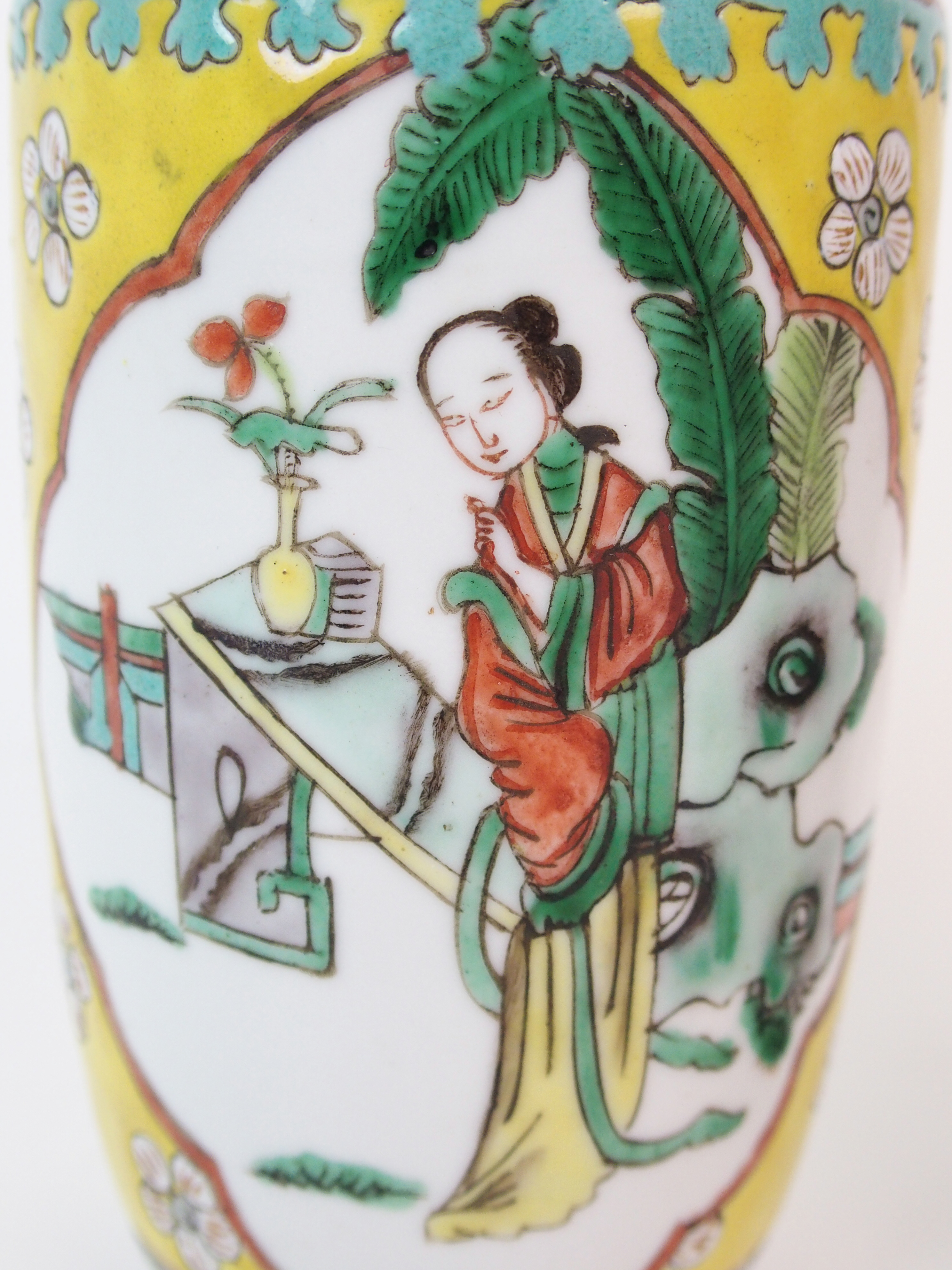 A pair of Chinese famille verte vases on a yellow ground, painted with panels of figures in ogival - Image 9 of 10