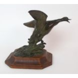 •A Scottish patinated cast bronze figure, by Phyllis M. Bone (Scottish, 1896-1972) depicting a