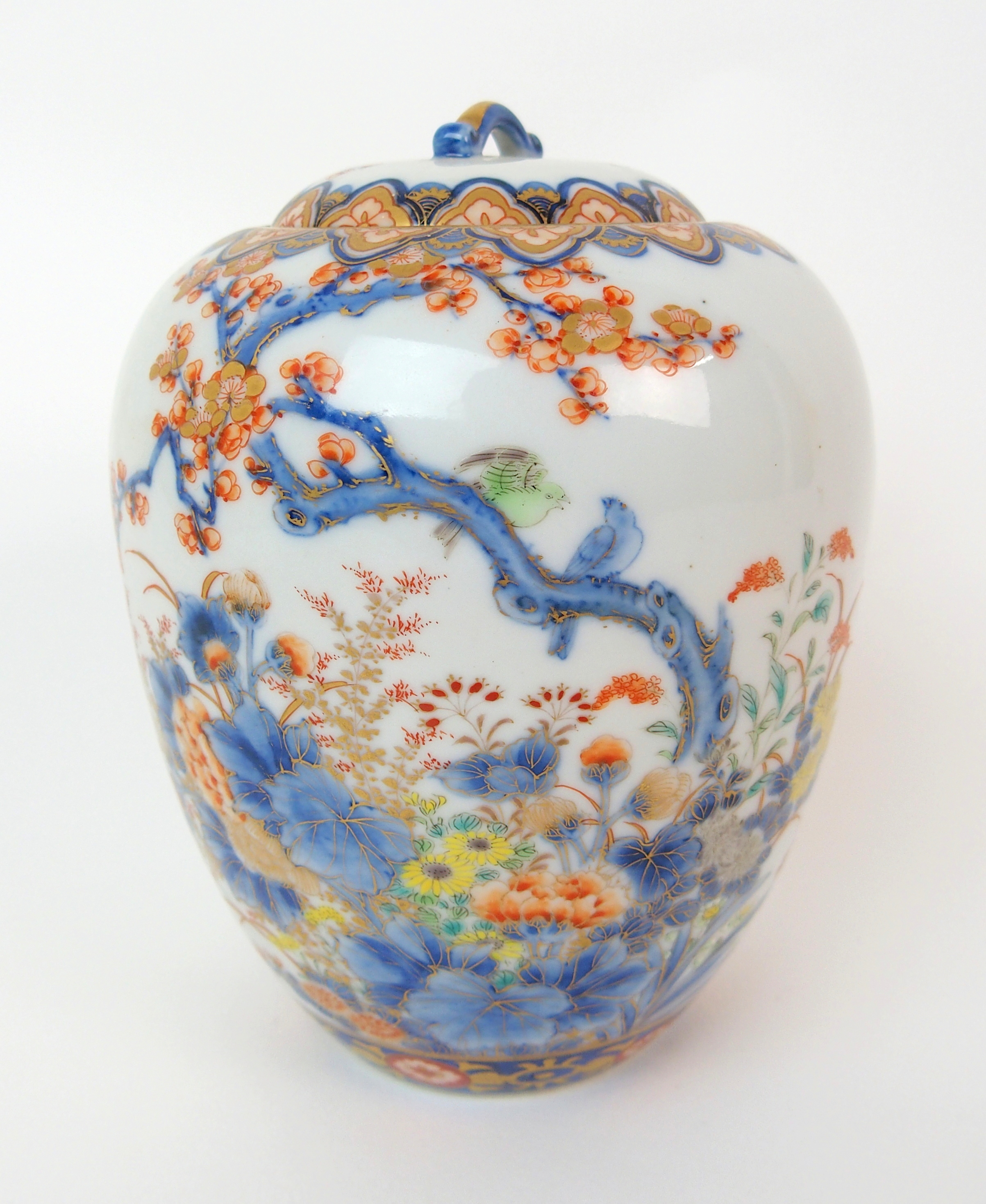 A Fukagawa oviform vase painted with various flowers and blossoming branches within foliate bands,