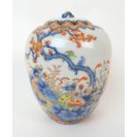 A Fukagawa oviform vase painted with various flowers and blossoming branches within foliate bands,