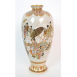 A Satsuma vase painted with numerous figures beneath a gilt foliate shoulder and above a stiff