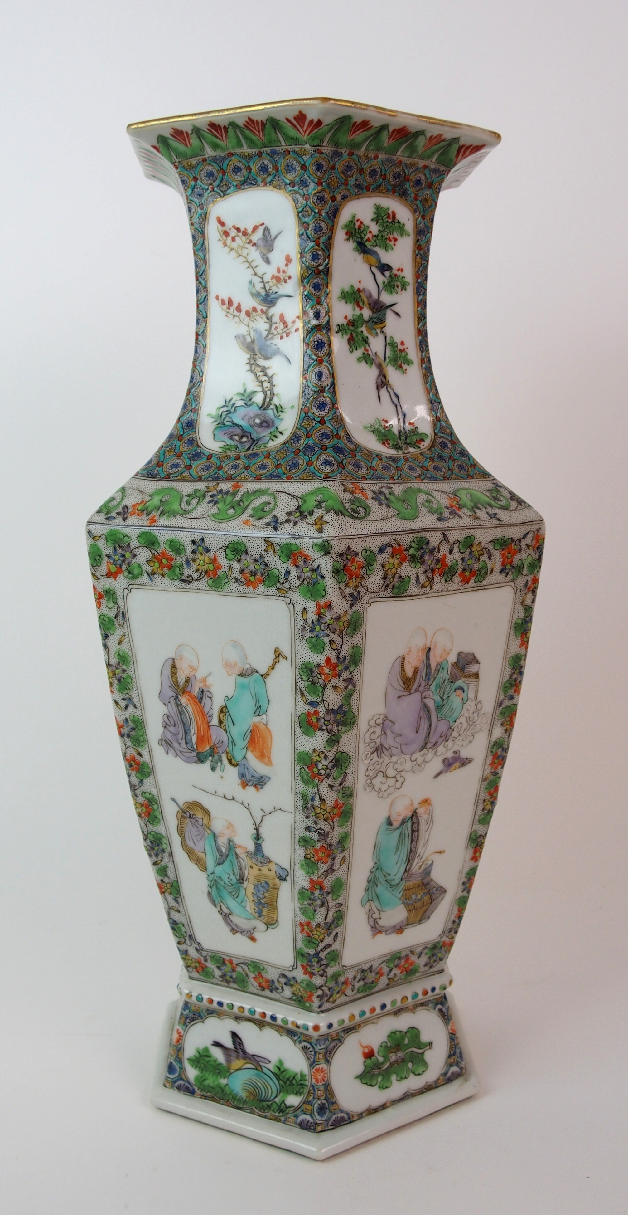 A Cantonese hexagonal tapering vase painted with panels of immortals within foliate and seed - Image 2 of 10